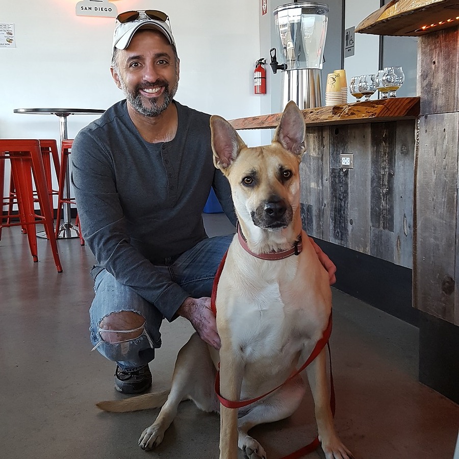 Kevin Malik, co-owner at Deft with his Dog Laguna